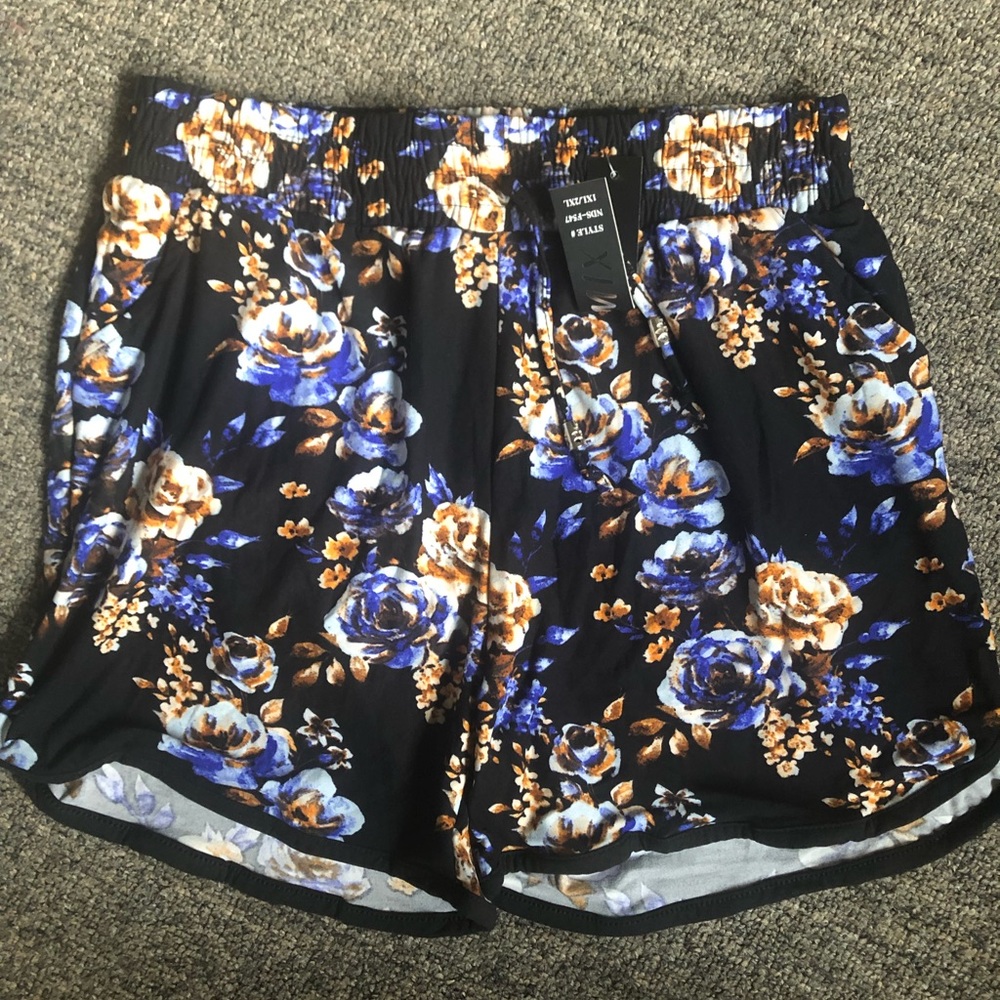 black blue floral dolphin shorts pockets